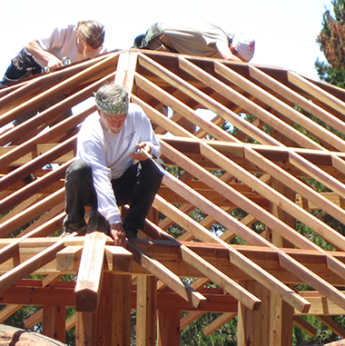 Karl Bareis, working on a roof